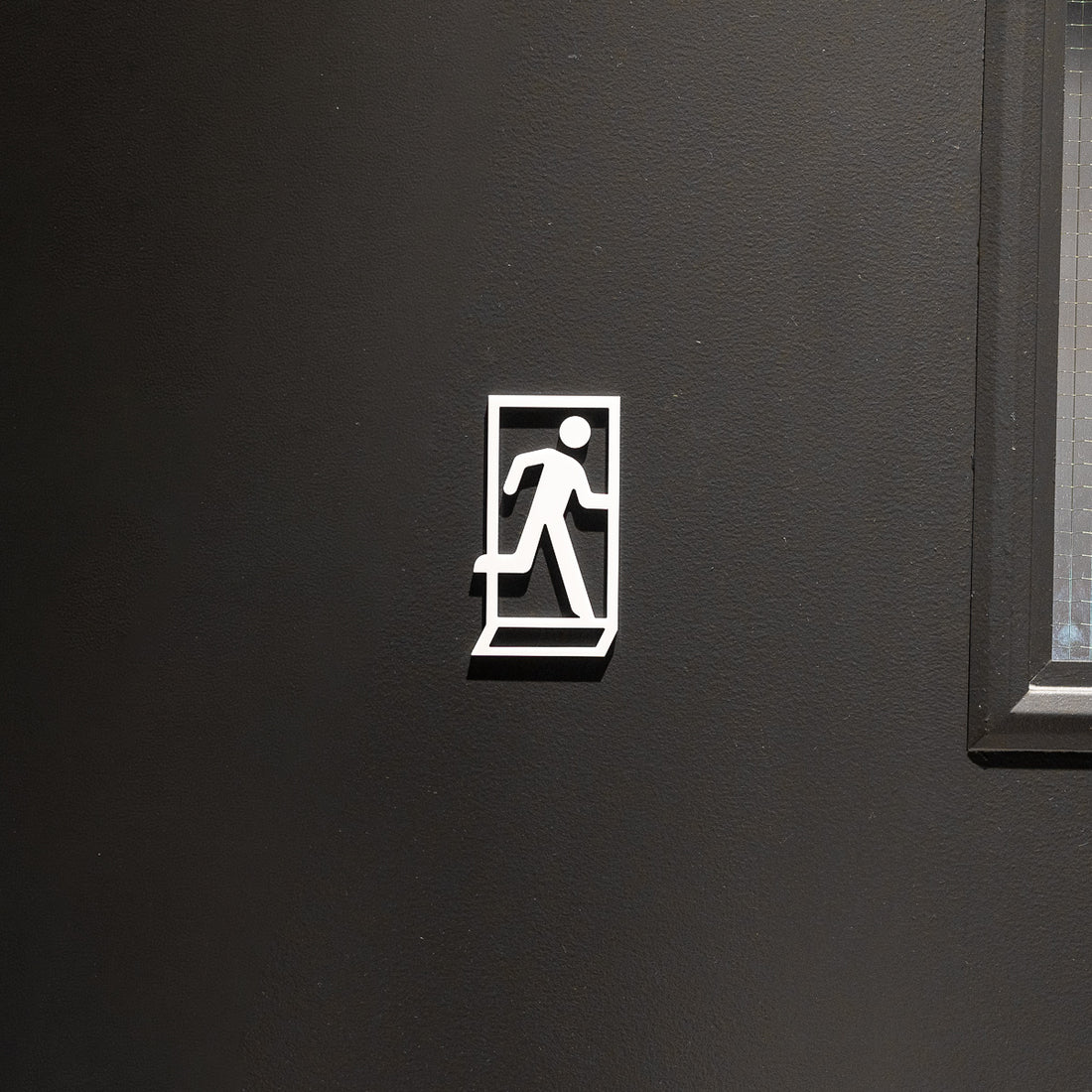 Pictogramme Sortie de secours en situation