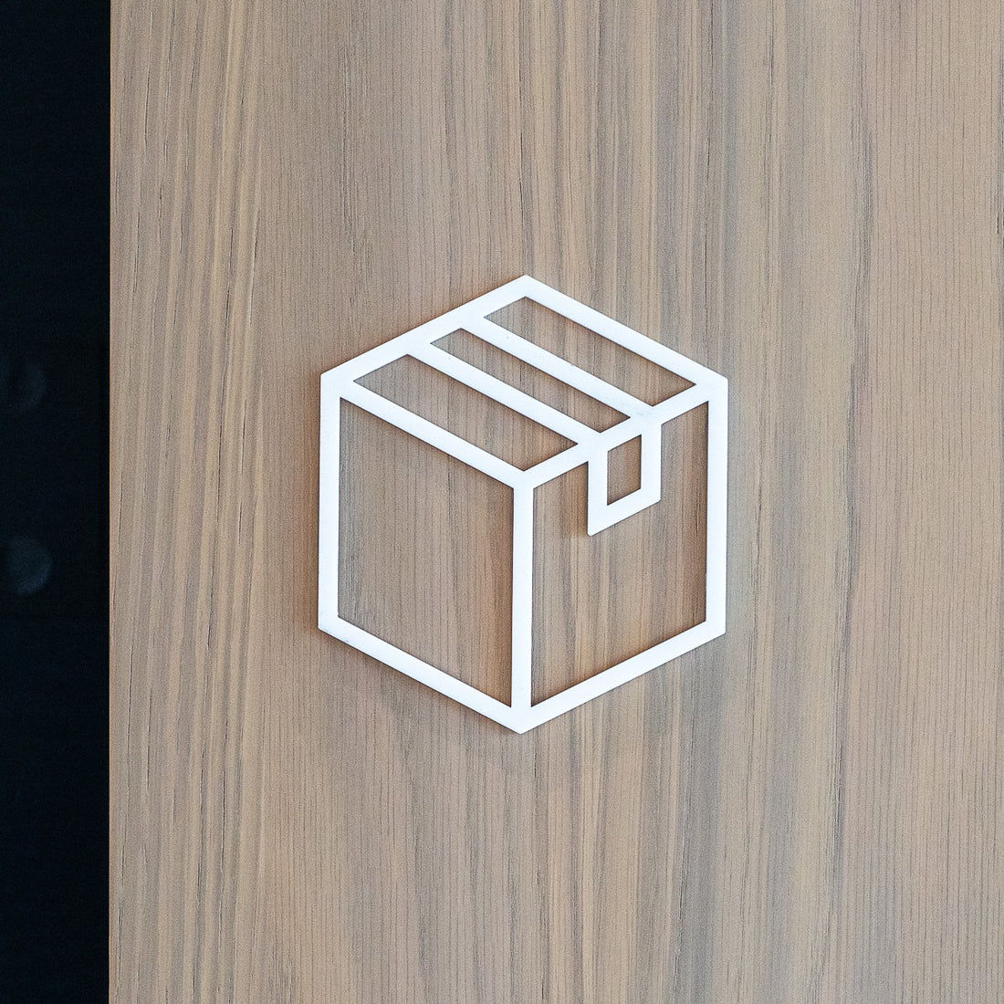 Pictogramme Colis blanc, vue rapprochée